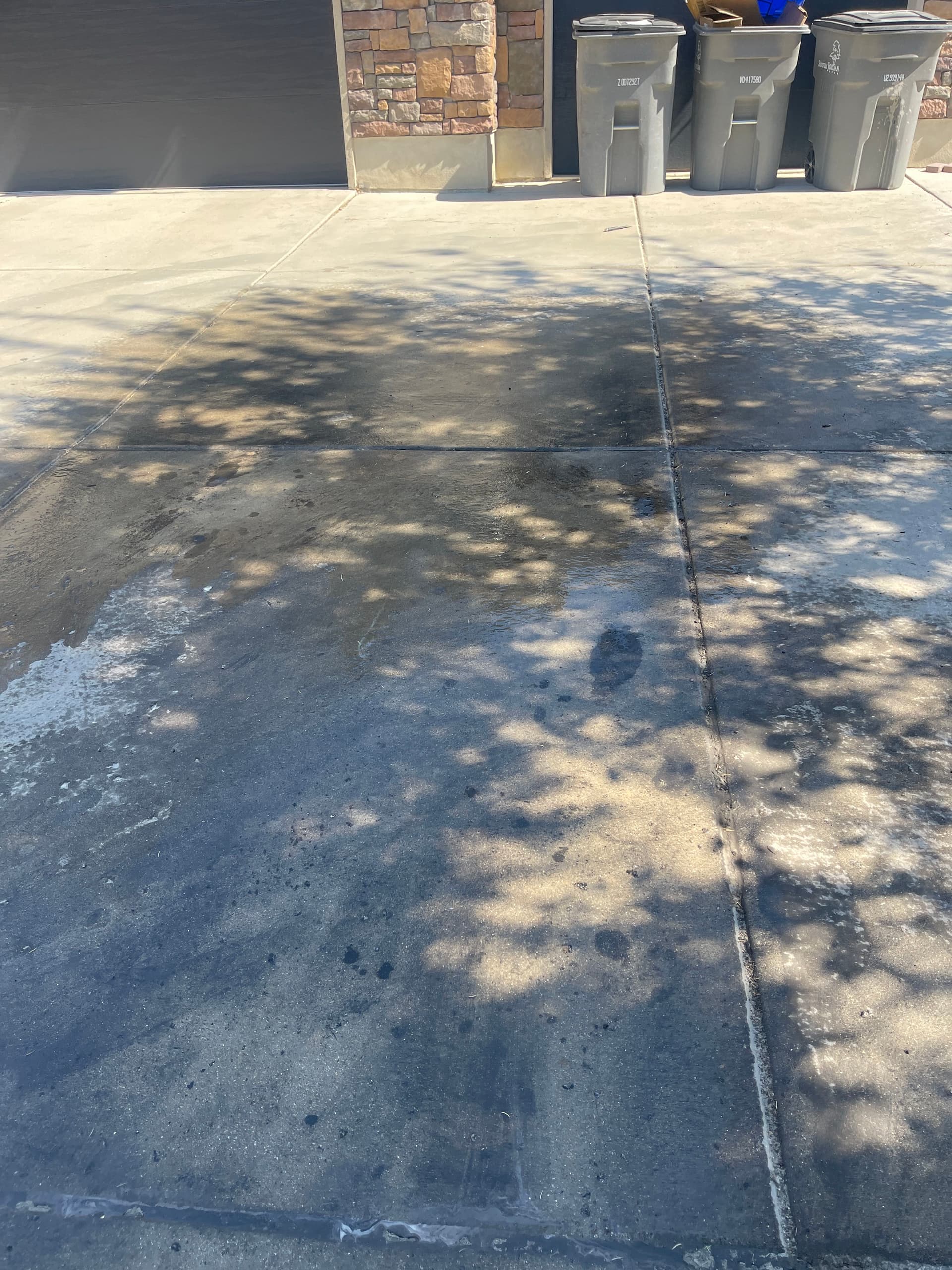 Gallery photos for Hydraulic Oil Stain Removed From South Jordan Driveway: Image #1