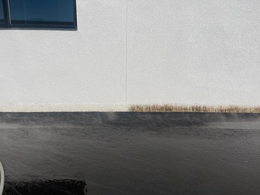 Gallery photos for Removing Asphalt Residue from a White Stucco Wall: Image #2